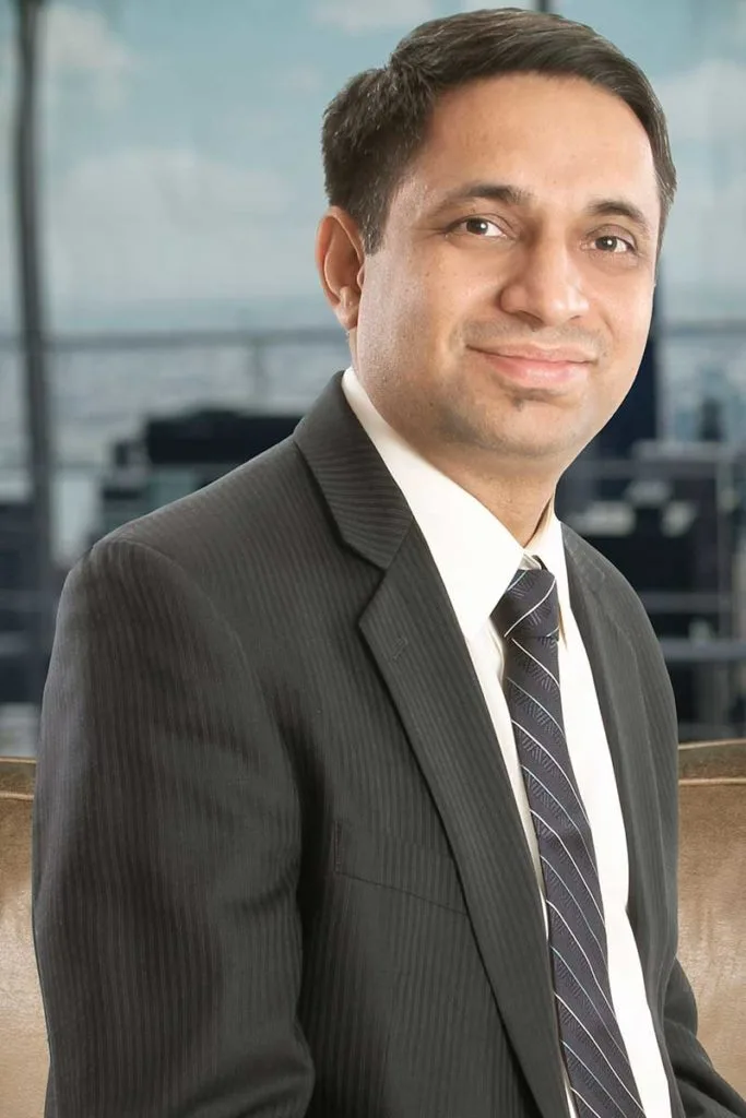 Portrait of Puneet Gaur, Chief Operating Officer of Next Quarter